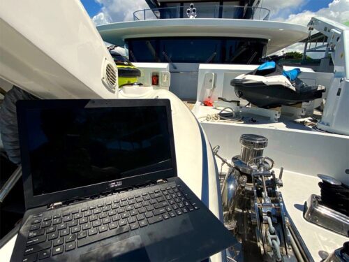 Outboard diagnostics on yacht deck